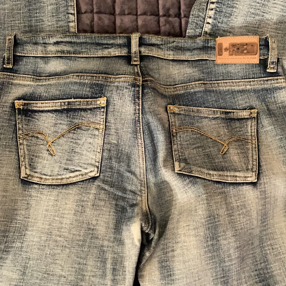 Indigo red washed‎ faded bootcut jeans